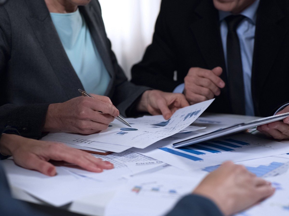 Executives and officials in strategic discussion